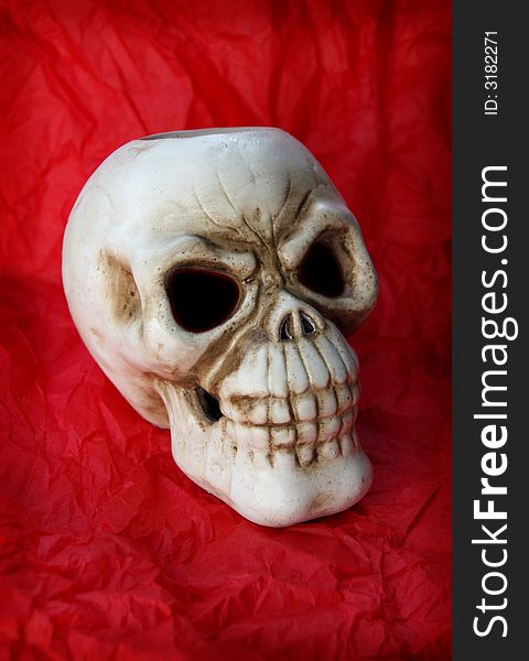 Ceramic skull with red backround. Ceramic skull with red backround