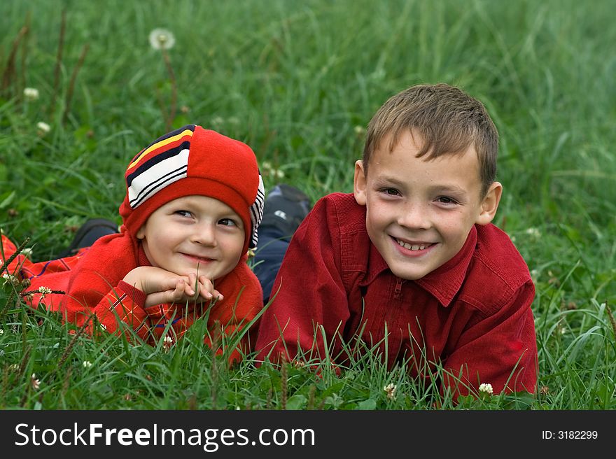 Two brothers on a grass