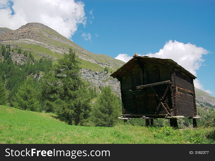 Old swiss hut in mountains