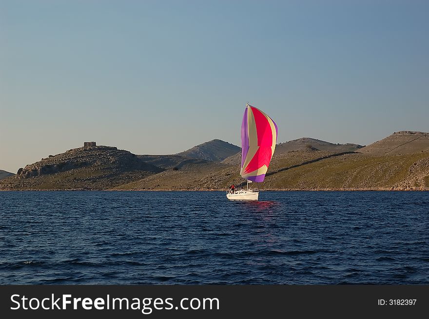 Sailing boat sailing trough National Park Kornati