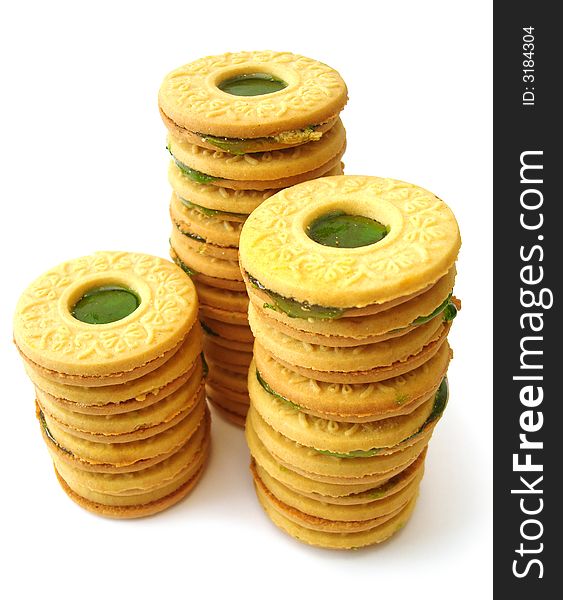 Cookies with kiwi jelly over white background