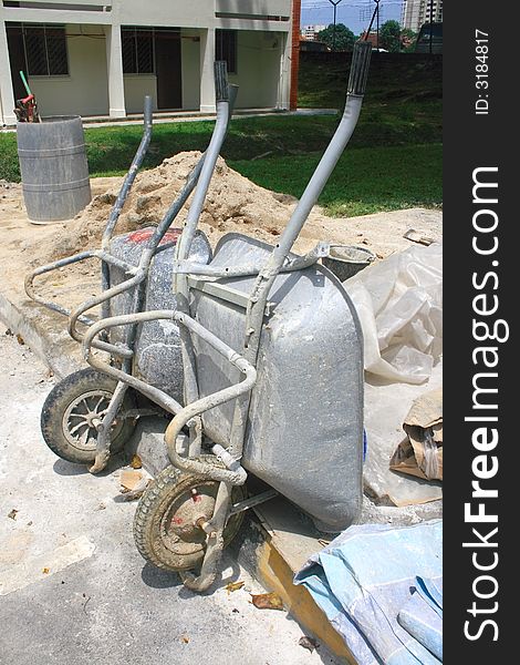 Twon Trollies in a construction side. Use for moving heavy materials.