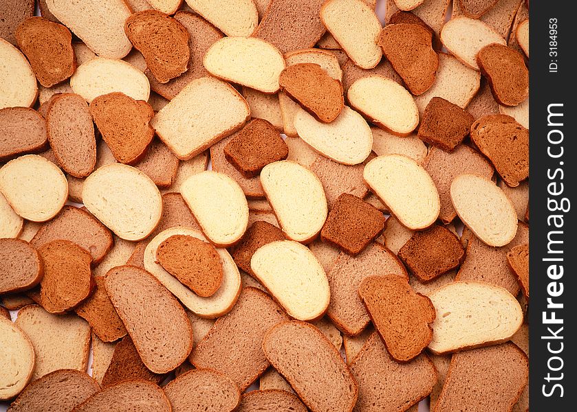 Slices of bread on a background of bread