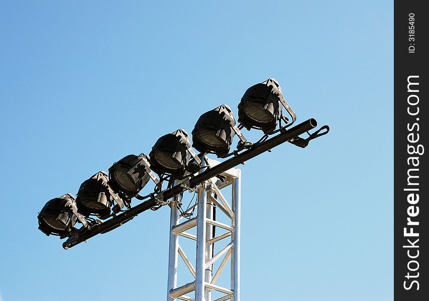 Six powerful spotlights atop a stand. Six powerful spotlights atop a stand