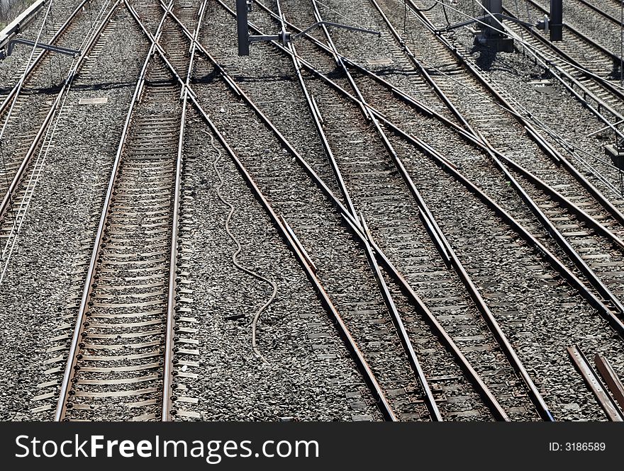 Many Railway Tracks In Front Of A Train Station