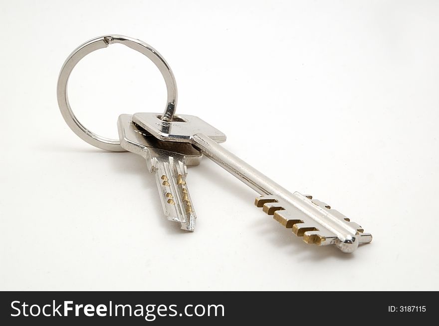 Keys of a appartment lying in white background