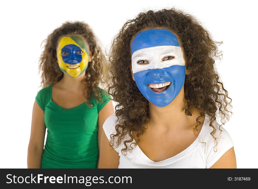 Portrait of young, Argentinian and Brazilian sport's fans with painted flags on faces. Smiling and looking at camera. Front view, white background. Portrait of young, Argentinian and Brazilian sport's fans with painted flags on faces. Smiling and looking at camera. Front view, white background