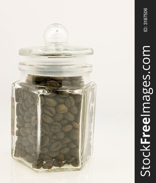 Coffee jar of beans on a white background