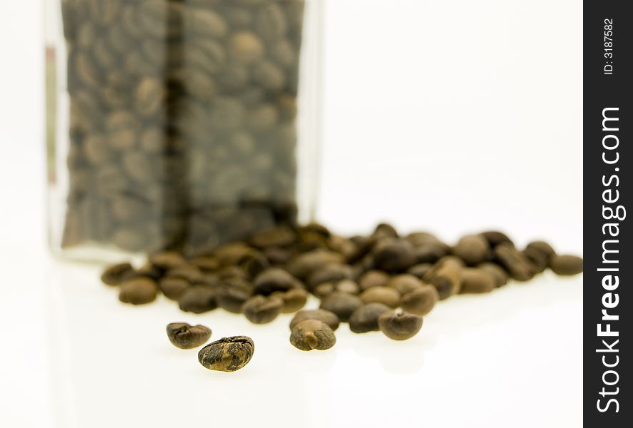 Coffee jar of beans on a white background. Coffee jar of beans on a white background