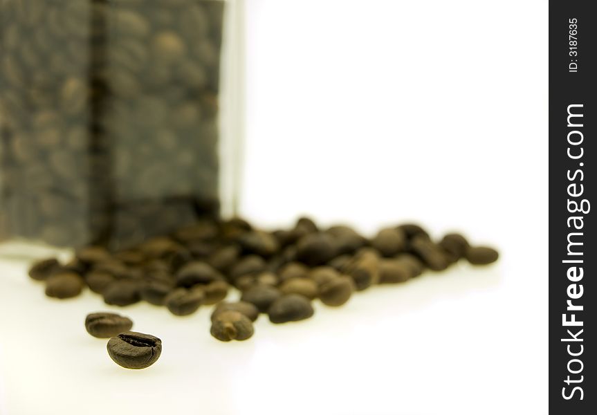 Coffee jar of beans on a white background. Coffee jar of beans on a white background