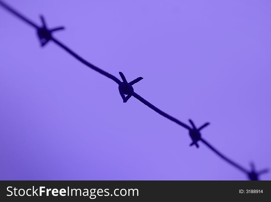 Barb wire close up background