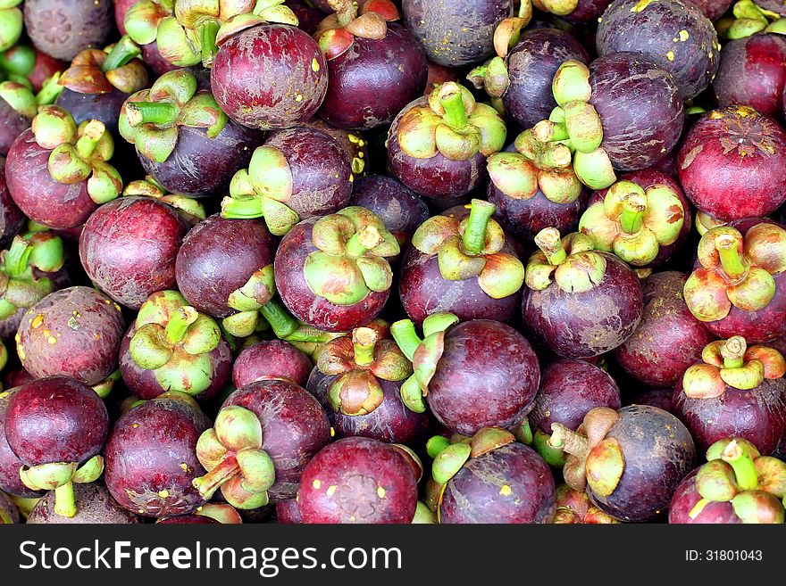 Pile of Mangosteen background or texture