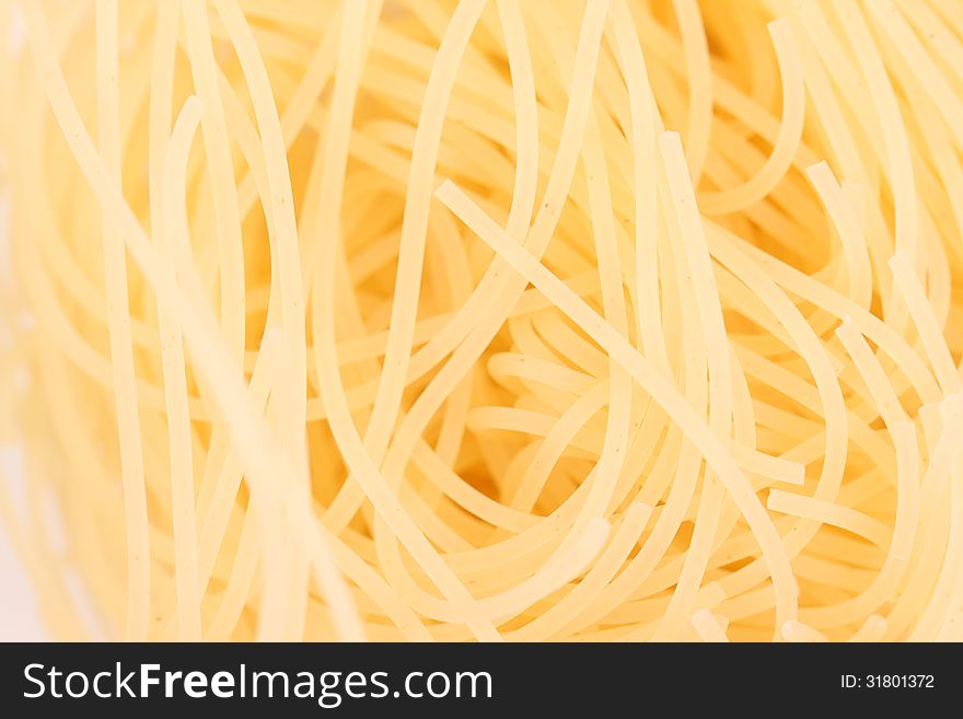A background of pasta capelli d angelo close-up.