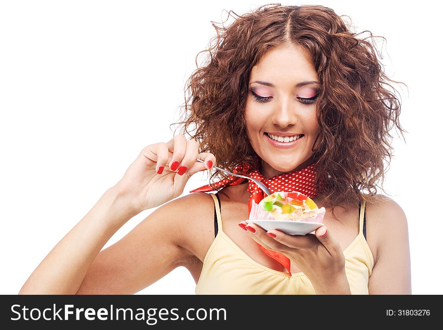 Lovely woman with a jelly cake against white background
