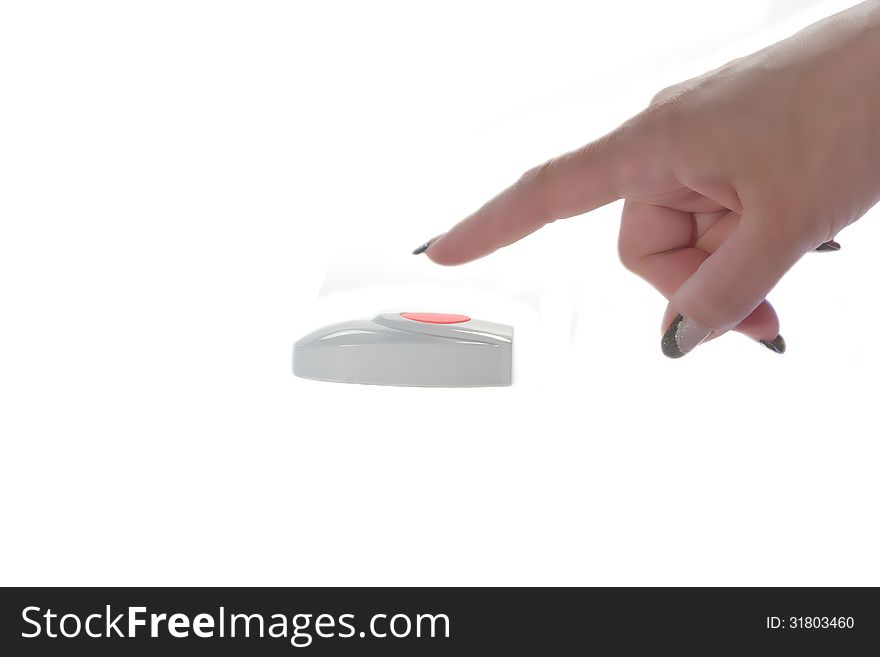 Female finger presses the red button