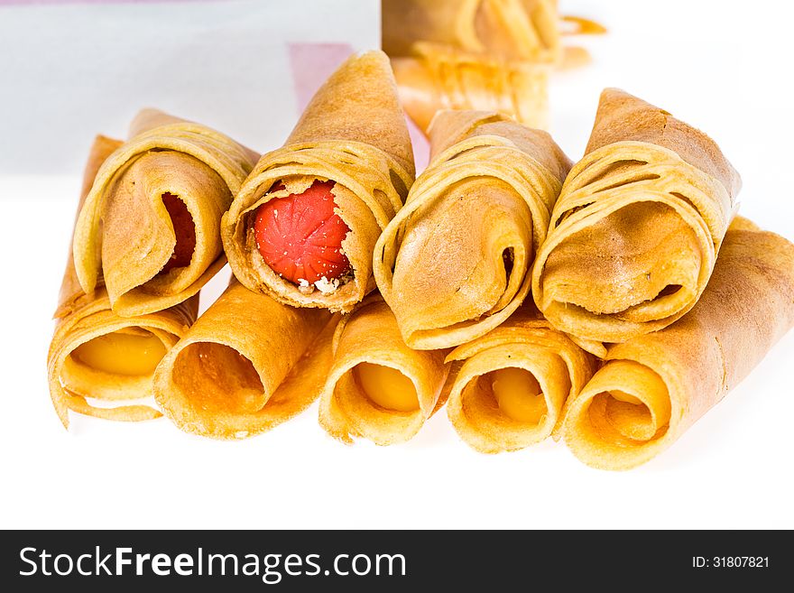 Rolled of Tokyo Pancake Sausage on white background. Rolled of Tokyo Pancake Sausage on white background