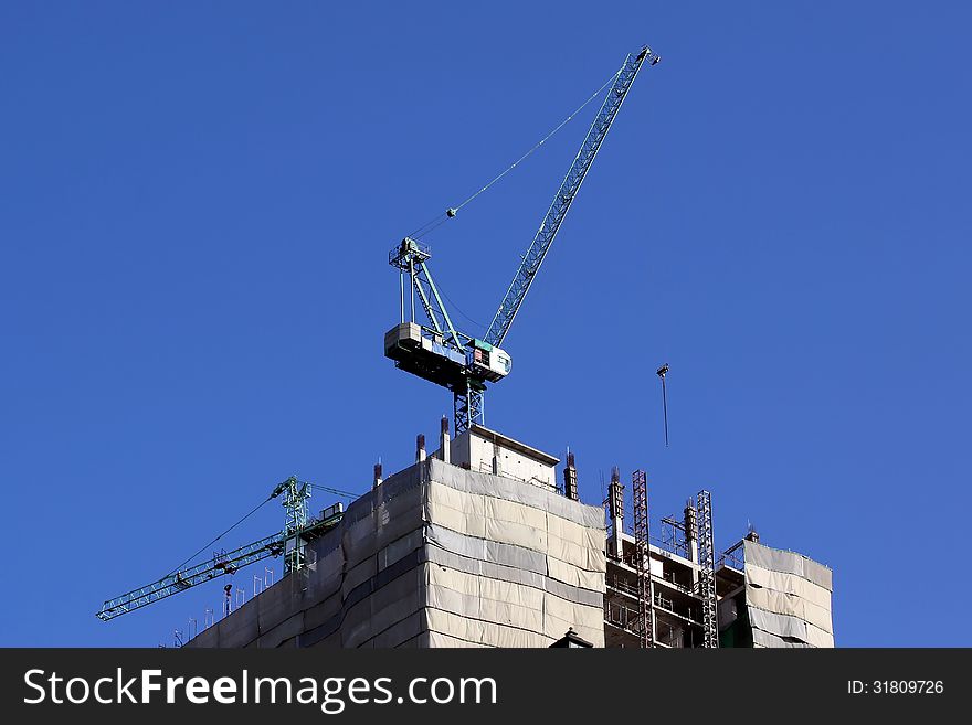 Tower crane and building under construction