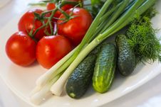 Tomatoes, Cucumbers And Spring Onions Royalty Free Stock Photography
