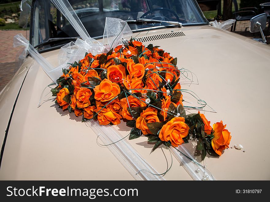 Wedding bouquet on the car
