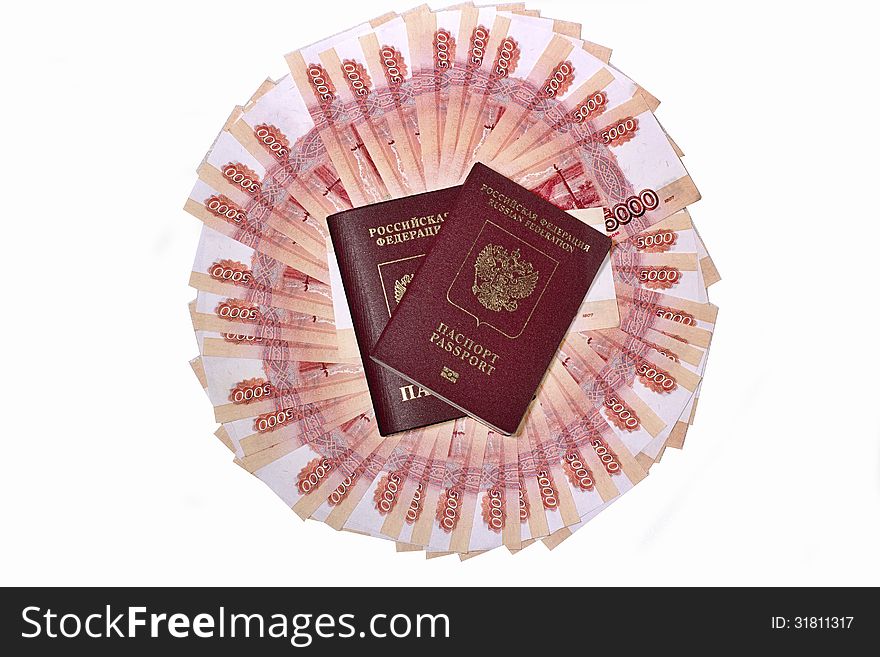 Russian passports in the background banknotes five thousand rubles