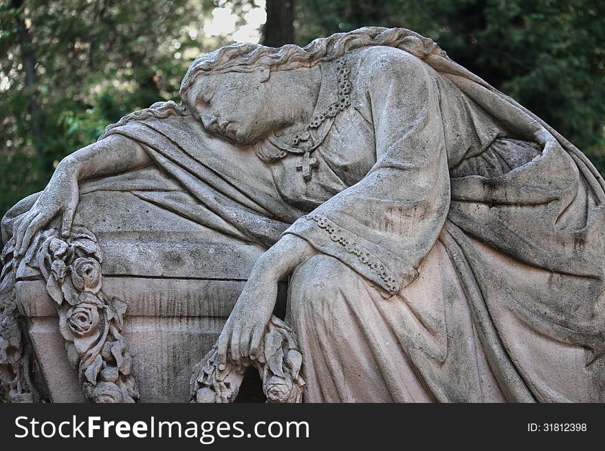 Statue Of Women On Tomb