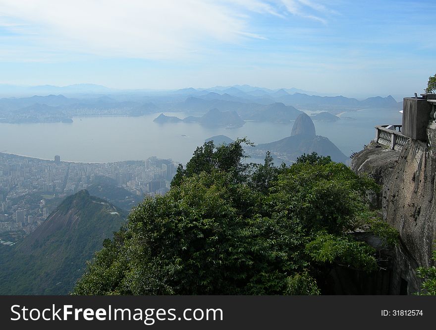 Rio de Janeiro, the city of the 2016 Olympiad, aerial view photographed from the Corcovado platform, Brazil, South America. Rio de Janeiro, the city of the 2016 Olympiad, aerial view photographed from the Corcovado platform, Brazil, South America