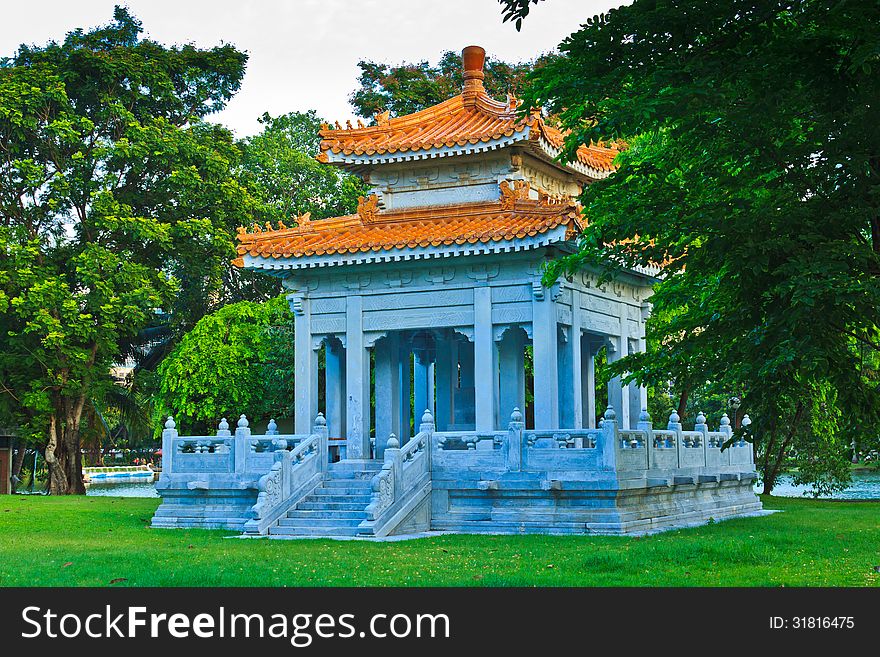 A rest house in the park. this is a green area in the city