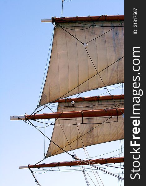 Detail Of Sailing Ship Rigging Against Blue Sky. Detail Of Sailing Ship Rigging Against Blue Sky