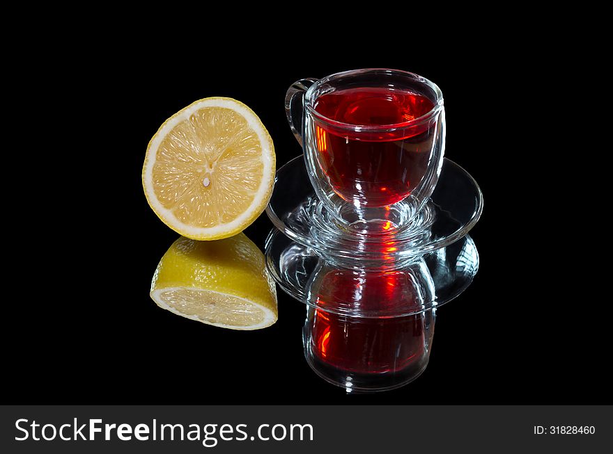 Red Tea And Lemon With Reflection