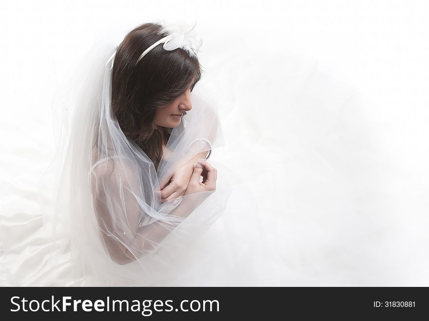 Isolated bride on white background with white dress