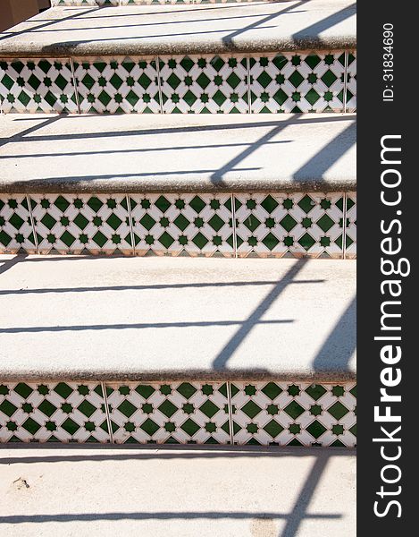 Detail of Spanish stairs with mosaic tiles.