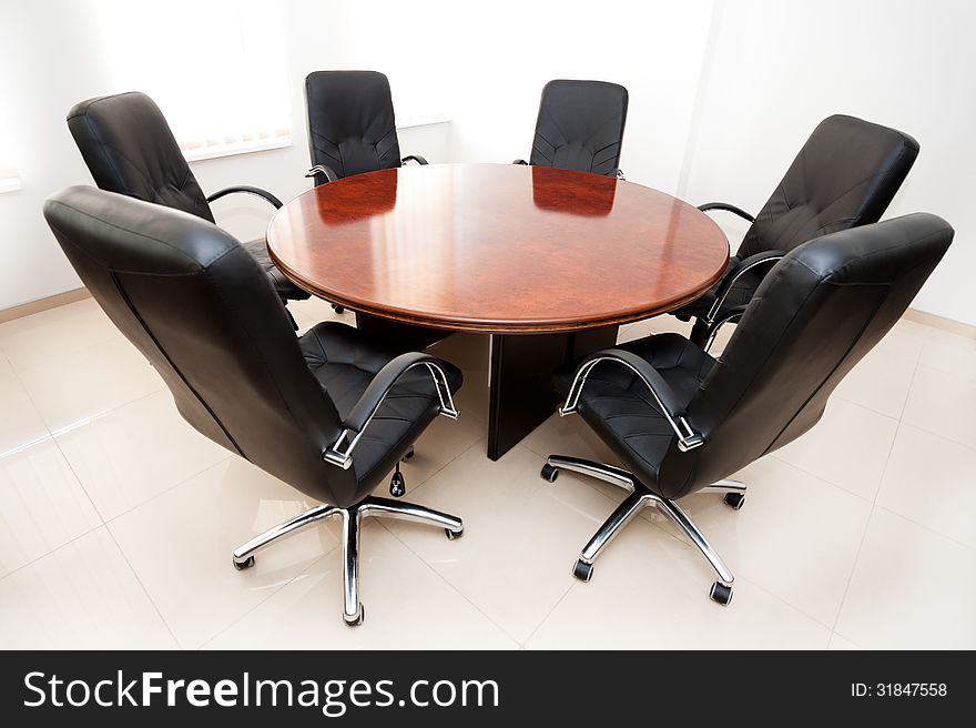Chairs and a table in the meeting room and talks. Chairs and a table in the meeting room and talks