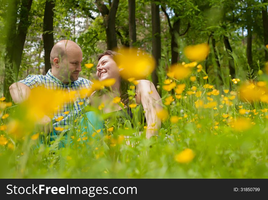 Sweet lovers between the buttercups