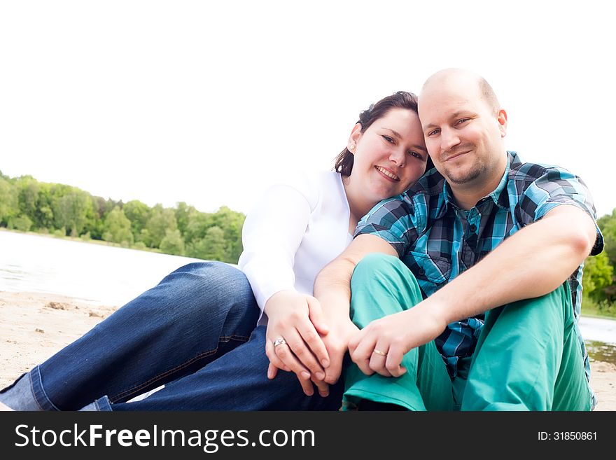 Smiling Couple On The Beach