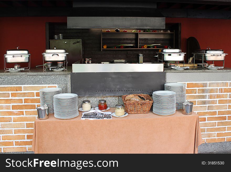 Kitchen equipments on the table for dining. Kitchen equipments on the table for dining