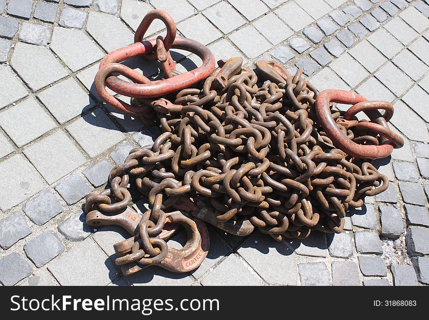 Industrial chain of iron on the pavement