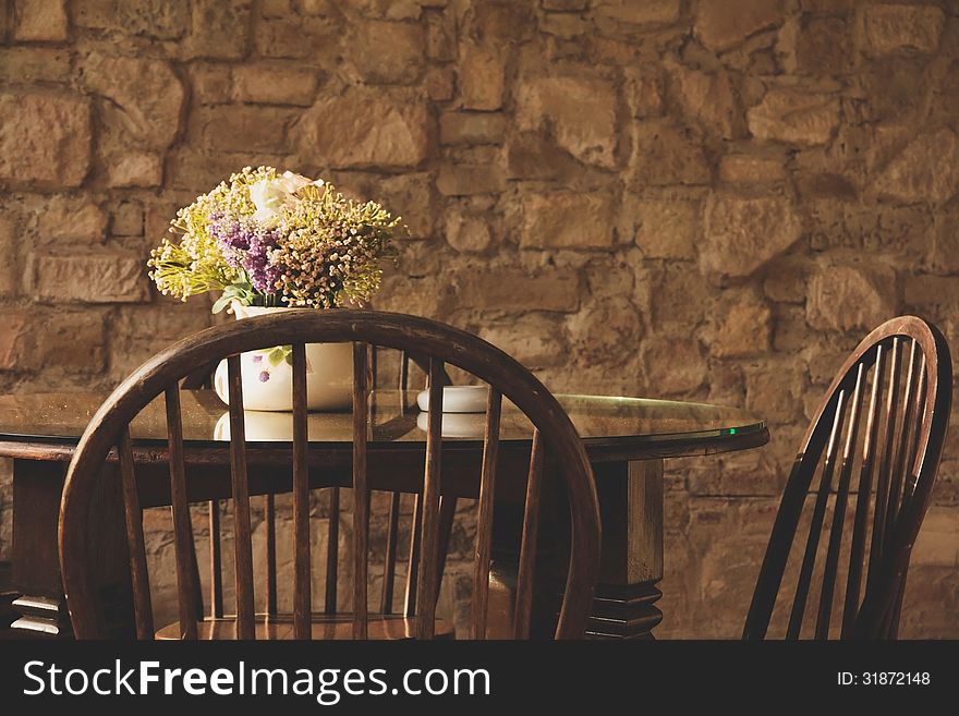 Vintage chair and table with flower