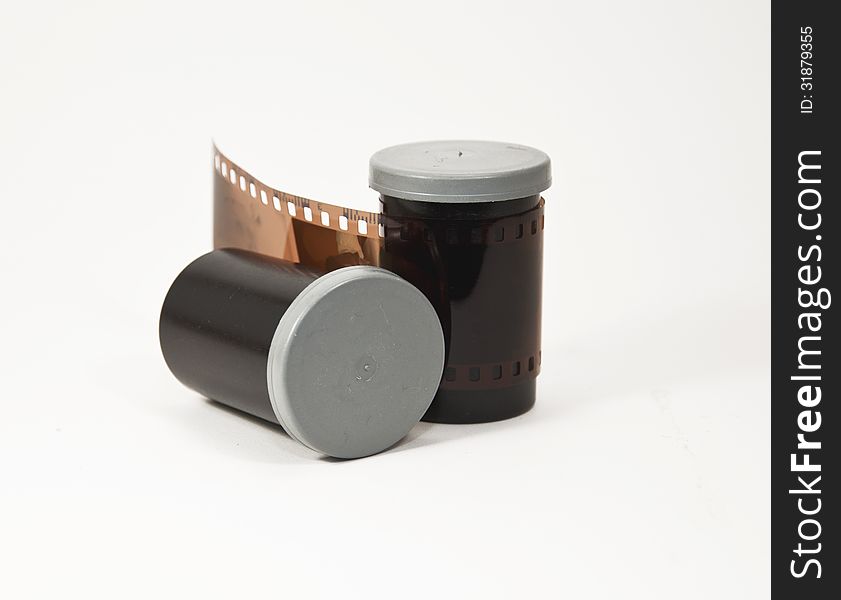 Film Canisters and a Negative