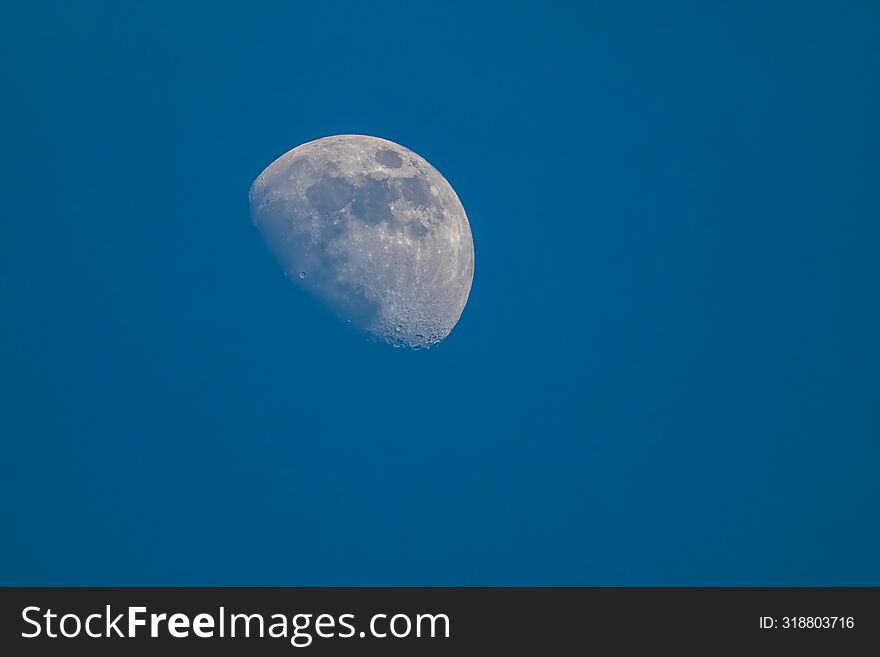 Daytime Blue Sky , Closeup Of The Moon Outer Space