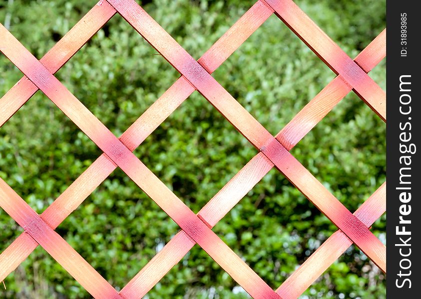 Wooden fence on green background. Wooden fence on green background