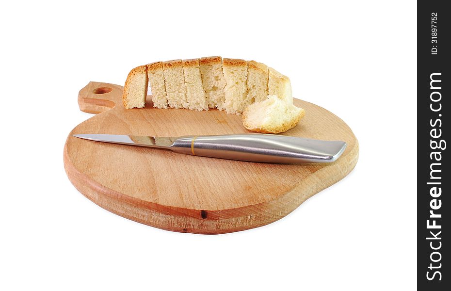 Composition with cutting board sliced bread and knife. Composition with cutting board sliced bread and knife