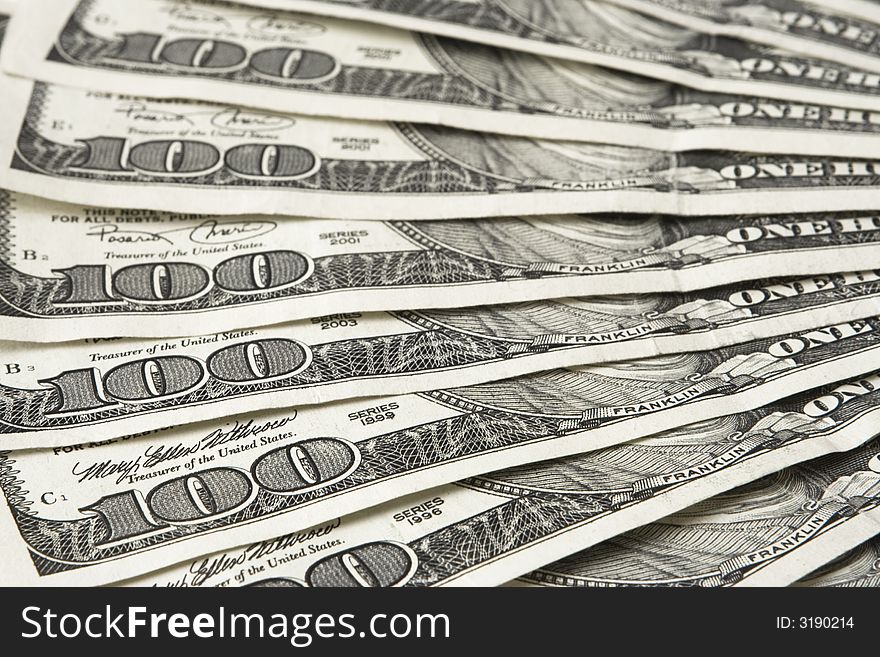 American hundred dollar bills isolated on a white background