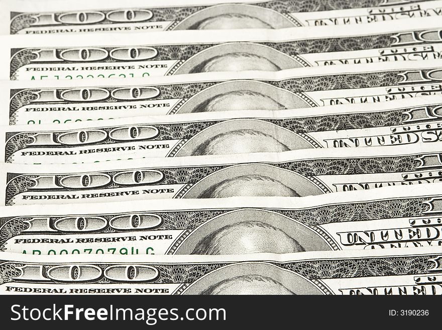 American hundred dollar bills isolated on a white background