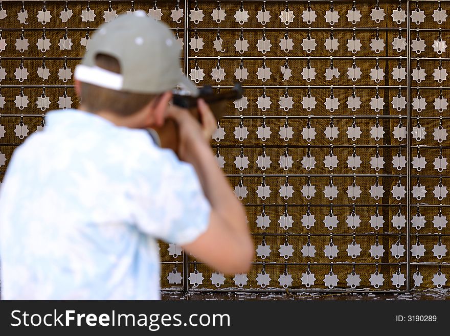 Shooting gallery at a fair. Shooting gallery at a fair