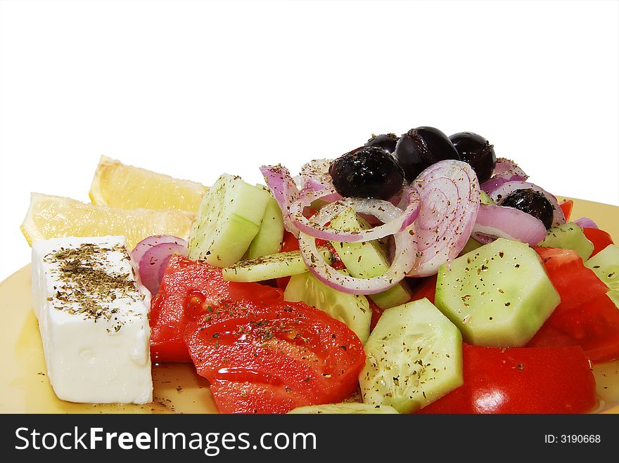 Fesh greek salad isolated on white background. Fesh greek salad isolated on white background