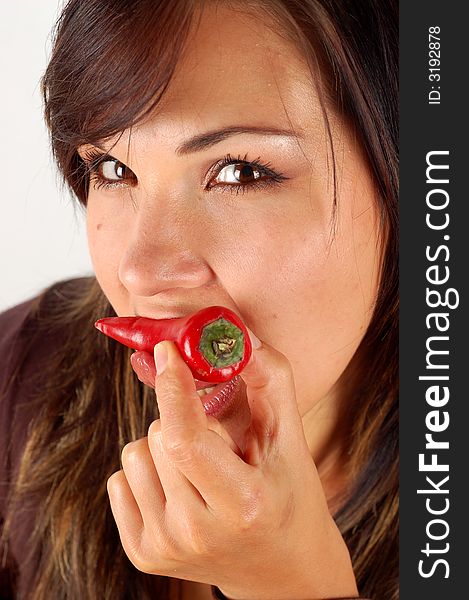 Woman Eating Red Pepper