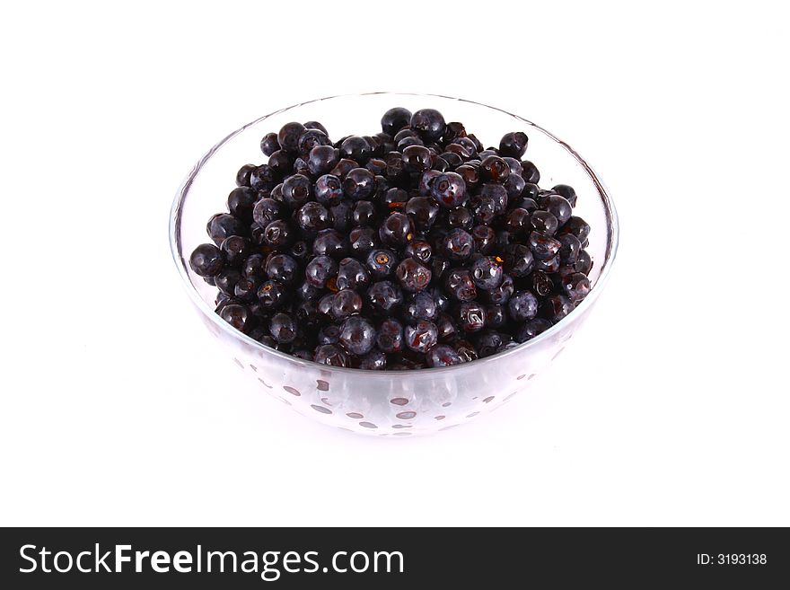 Blueberry close up isolated on white in glass. Blueberry close up isolated on white in glass