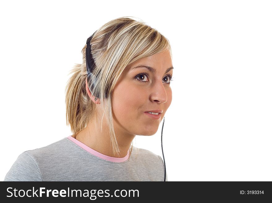 Young girl working with head phones. Young girl working with head phones