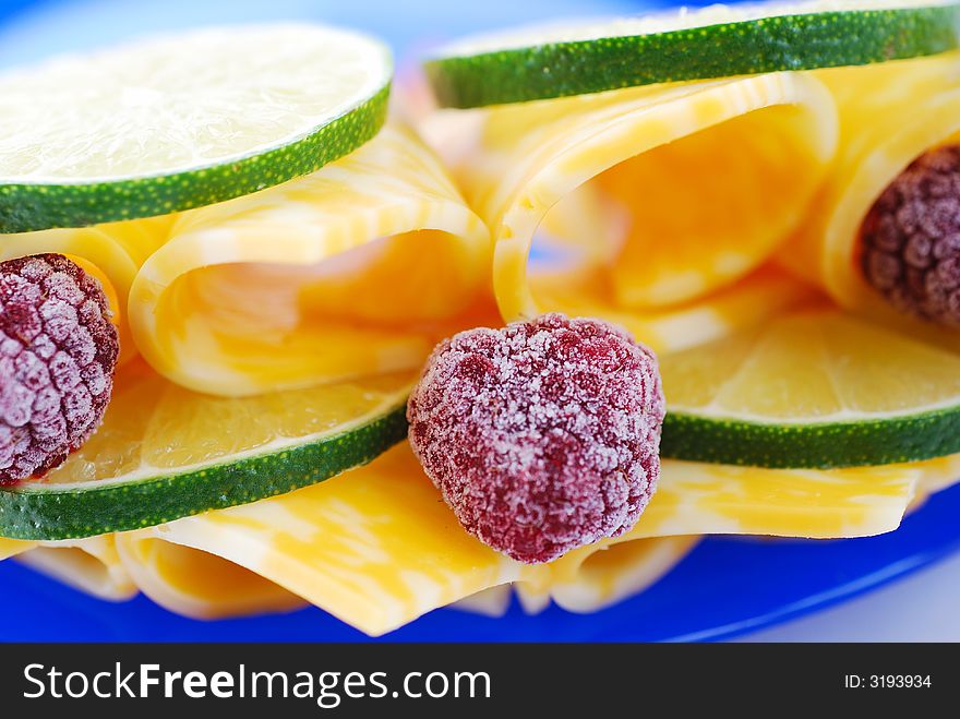 Delicious snack - lime, cheese and raspberry. Delicious snack - lime, cheese and raspberry