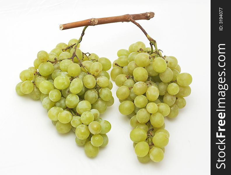 Bunch of white grapes on white background